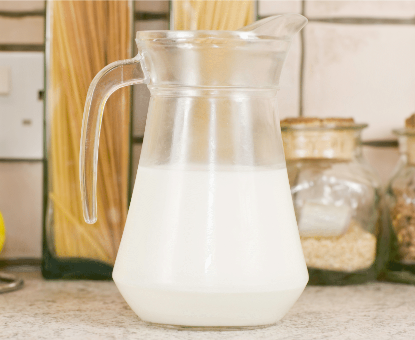 jug of milk sitting on counter
