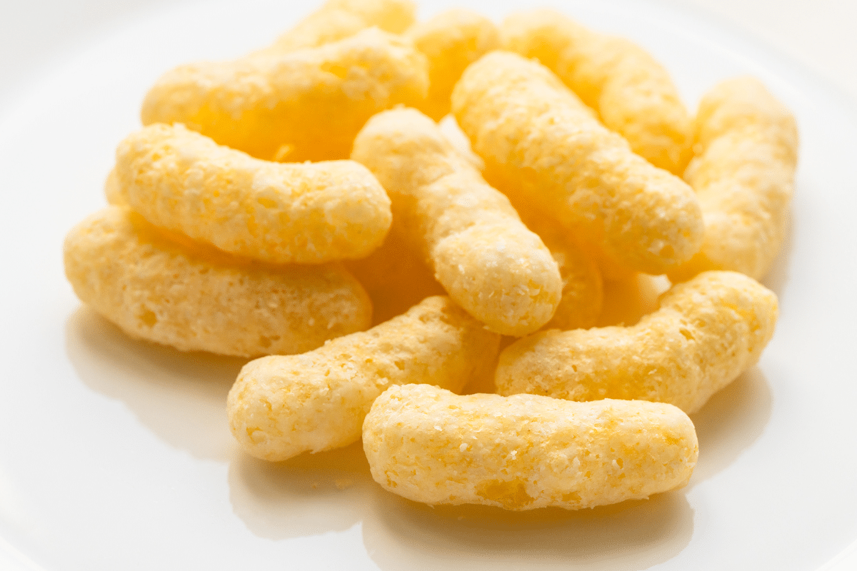 Cornpuff snack in white plate