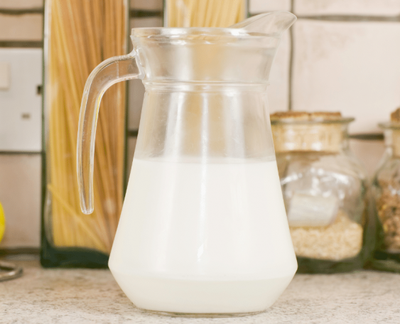 jug of milk sitting on counter