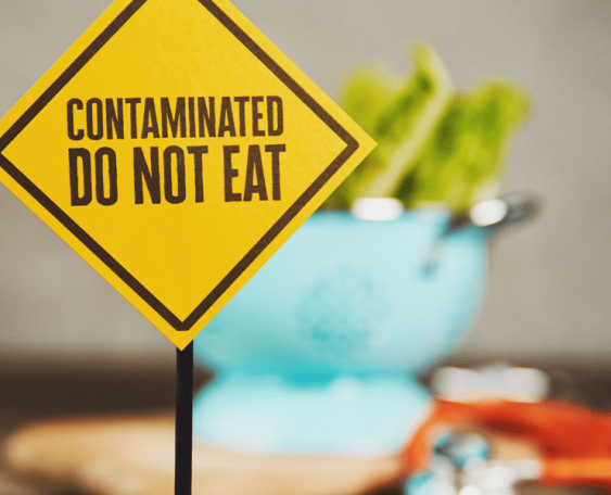 contaminated food with warning sign