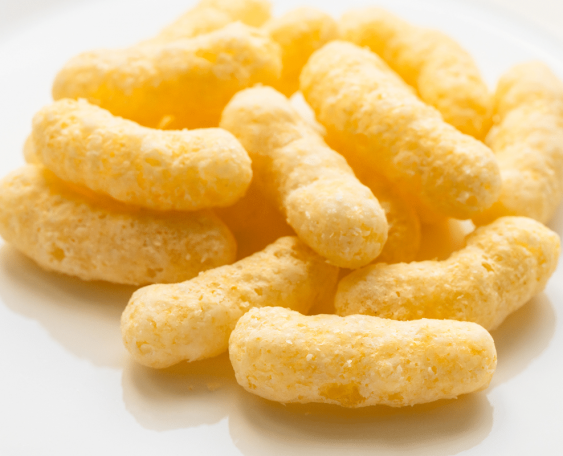 Cornpuff snack in white plate